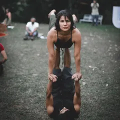 Flying with an amazing Poi master at a yoga festival. Acro yoga brings together people with different movement backgrounds.