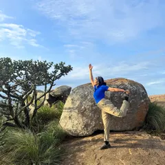 Finding my balance with Natarajasana during a trek to Uttari Betta. The hills around Bengaluru offer the most stunning backdrops for a yoga practice.