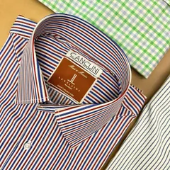 A freshly made custom shirt in a bold stripe, crafted from premium Canclini fabric. The crisp collar and quality material make it a standout piece for any office or casual look.