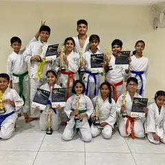 Our students from the Purva Belmont dojo show off their impressive collection of trophies and certificates after a successful outing at the Independence Day Cup in Bangalore.