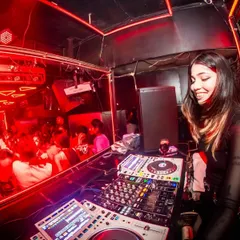 The red lights and packed dance floor at Underground, The HHI. These are the nights I live for, playing a mix of techno and house music.
