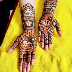 Celebrate your baby shower with custom mehndi. This design announces "It's a Boy!" and includes motifs of a baby in a cradle, tiny clothes, and footprints.