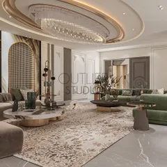 From this angle, you can appreciate the rich textures and materials used. The combination of polished marble floors, plush rugs, and metallic accents creates a sophisticated and inviting environment for both relaxing and entertaining.