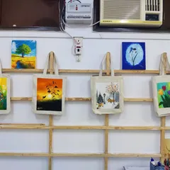 The beautiful results of our tote bag and canvas painting workshop for AIIMS doctors, displayed in our studio. Each piece is a unique expression of creativity.