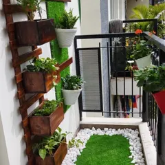The base of the vertical garden, showing how we use a mix of trailing and upright plants to create a full, lush look from top to bottom.