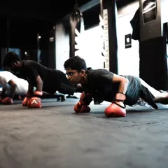 Knuckle push-ups are not for the faint of heart. This exercise builds wrist strength and punching power.