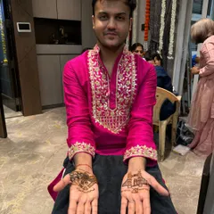 A happy groom showing off his custom design. On one hand, we have the London Bridge to represent a special place for the couple, and on the other, their wedding logo.