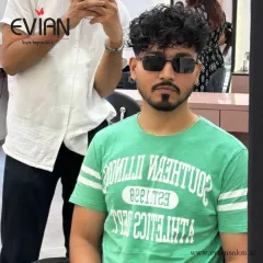 The client checking out his new cut in the mirror. My goal is to deliver a style that not only looks great in the salon but also empowers you with confidence.