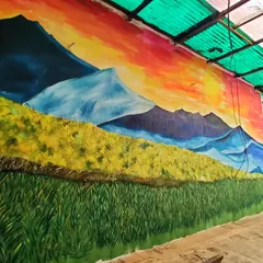 I call this "The Sunset Wall." The vibrant colors of the sky blend from fiery orange and red to a cool purple, reflecting over the mountain range and fields of flowers.