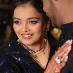 This is what a dreamy Sangeet night looks like. For this bride, I created a glamorous look with bold, sparkling eyes to match the celebratory mood, capturing a beautiful, candid moment with her partner.