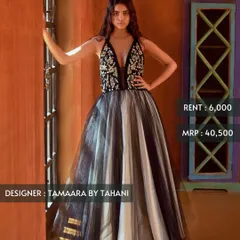 Make a statement at your next cocktail event with this black and white tulle gown by Tamaara by Tahani. Featuring a plunging neckline and an embellished bodice, it's available for just ₹6,000.