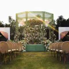 The wedding aisle view, leading towards the elegant gazebo mandap, showing how the design harmonizes with the open lawns of the Golfshire venue.