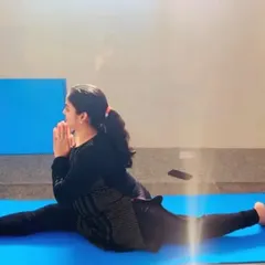 A moment of focus and surrender in Hanumanasana, the full front split. This posture is a powerful hip opener that we approach with careful preparation, focusing on lengthening the hamstrings and psoas muscles.