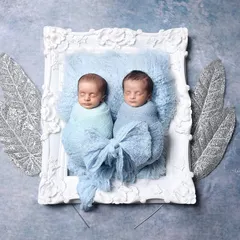 Two little souls, one heart. This artistic portrait, with the twins framed and adorned with silver leaves, was pure magic to create.