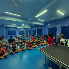 A wide view of our athletes gathered for a mental conditioning workshop. These sessions are an integral part of our holistic training philosophy.