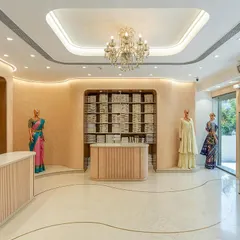 Another view of the ground floor lobby, showcasing the custom shelving and display mannequins. This floor sets the tone for the shopping experience across the five levels of the store.