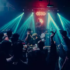 The energy in the club is a beautiful chaos. This shot captures the vibe of a packed house, with everyone lost in the music and the lights.