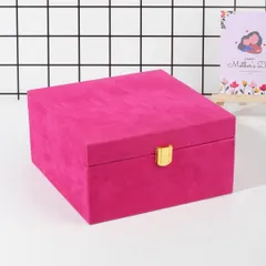 The elegant and reusable pink velvet box, closed. This packaging is part of the gift itself, perfect for storing keepsakes long after the skincare products are enjoyed.