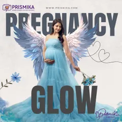 You are creating a miracle, and you deserve to feel like an angel. This portrait features a flowing light blue gown and beautifully crafted angel wings, capturing the ethereal and heavenly glow of motherhood.