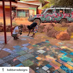 Our collaboration with the artisans of Bábbarra Designs is a story that continues to unfold. Here, they are selecting historic lino tiles which our artisans will translate into durable teak woodblocks, preserving their craft for a new generation.