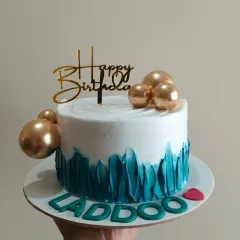 Another look at the modern teal and gold birthday cake.