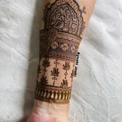 The full arm band for the baby shower design, with a peacock motif above a pattern of blooming lotuses.