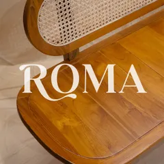 The 'Roma' bench, an artful fusion of strength and beauty. This custom teak wood bench features a solid, gently curved seat and an intricate rattan backrest.