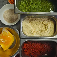 The core ingredients of my cooking: Kharda (green chilli paste), ginger-garlic paste, my special Kolhapuri tikat masala, ghee, and sesame seeds. This is where all the flavour begins.