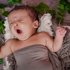 A big yawn and a big stretch. These are the real, unposed moments that I love to capture. It shows so much of their tiny personality.