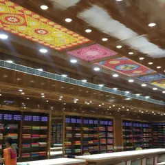 This is the final installation of our custom Lippan art panels on the ceiling of a large saree showroom. The bright, traditional patterns completely transform the ceiling into a stunning feature, adding luxury and cultural richness to the retail space.