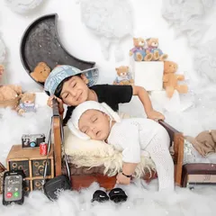 The bond between siblings is so special. Capturing the gentle curiosity and love of an older brother for his new baby sibling is one of the most heartwarming parts of my job.