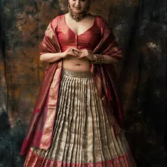 Another pose from this royal-themed shoot. The movement in the dupatta adds a touch of grace and dynamism to the portrait.