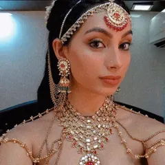 A behind-the-scenes selfie from the set of the film Ponniyin Selvan. This showcases the magnificent and authentic period jewelry used in epic productions, a style I am very comfortable and familiar with.
