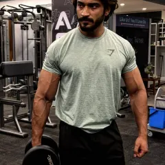 Hustle for that muscle. A simple dumbbell workout, focusing on form and control to build quality muscle tissue.