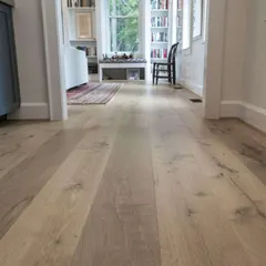 I installed this light, ash-toned wood flooring to give this space a modern, Scandinavian feel. It’s a perfect neutral base that is bright, clean, and works well with a minimalist design approach.