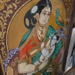 A vintage-style painting depicting Yashoda with baby Krishna. This piece showcases our ability to work in traditional Indian art styles, creating works that are rich in cultural heritage and narrative.