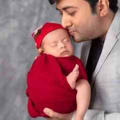 A father's gentle hold, a promise of protection and love. These father and baby portraits are always some of the most touching images from a newborn session.