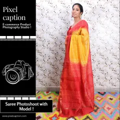 A smiling model presents a vibrant saree, showcasing its appeal for festive or daily wear. This kind of lifestyle model photography helps customers connect with the product emotionally.