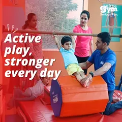 Active play, stronger every day. This shot captures a busy moment in our gym, with parents, coaches, and kids all engaged in activities that build strength and skill.