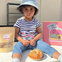 This little one is ready to dig into a Korean Cream Cheese Bun. My bakes are loved by customers of all ages.