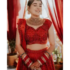 The pure joy of a bride on her wedding day. This portrait of Jhanvi captures a moment of genuine happiness, her eyes closed in a blissful smile.