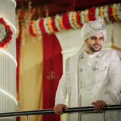 A happy and candid-style portrait of the groom, Tayab Ahmad, smiling during his wedding ceremony. We capture the joy of the groom just as much as the bride's.