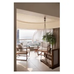 A home should be a sanctuary. For this Mumbai residence, we designed a custom bay window swing, creating a serene corner that captures the sea breeze and offers a tranquil escape from the city, demonstrating our love for maximizing views and natural light.