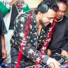 Sharing a moment with my fellow artist while spinning at a club. The energy between the performers is just as important as the music we play for the crowd.