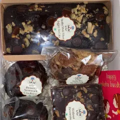 This Rakhi hamper is packed with a variety of my healthy treats. It includes a wholewheat jaggery tea cake, a walnut fudge brownie, and two types of my popular New York style cookies.