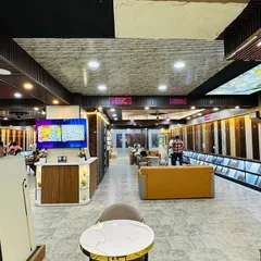 Another perspective of the showroom, showing the well-lit environment and organized displays. I have created a space where you can comfortably browse and visualize how these products will look in your home.