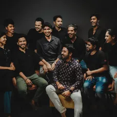 A candid moment with our team. We believe that great work comes from a place of joy and collaboration, and we bring that positive energy to every wedding we shoot.