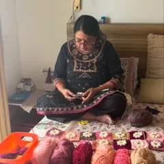 This is me, Nishtha, in my happy place, surrounded by colorful threads. Every piece starts right here, with immense patience and love. I handle each knot myself to ensure every creation is filled with what I call ‘nani jaisa pyaar’.