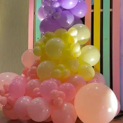 A close-up of a multi-colored balloon arrangement, perfect for adding a pop of color and joy to a baby shower celebration.