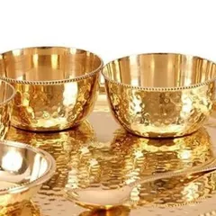 I use high-quality, traditional hammered brassware for serving, adding an authentic and royal touch to the dining experience.